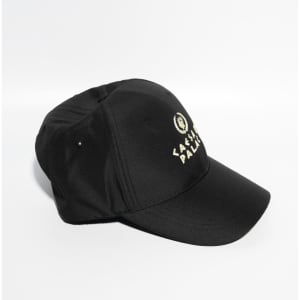 A black baseball cap with a Velcro strap and a logo on the front. Features six panels.