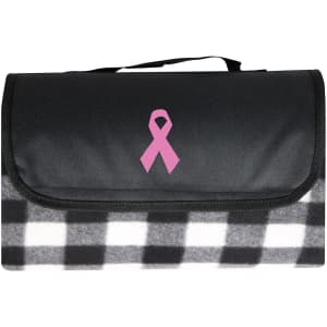 A black and white checkered picnic blanket with a pink ribbon design and a carry handle.
