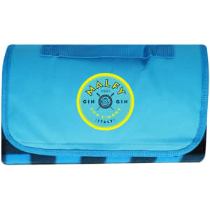 A blue picnic blanket with a folded design and a circular logo in the centre.