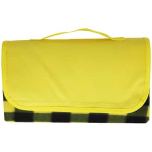 A yellow picnic blanket with a black and yellow checkered pattern, featuring a carrying handle on top.
