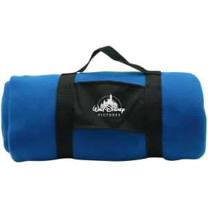 A rolled blue blanket secured with a black strap. It features a logo on the front.