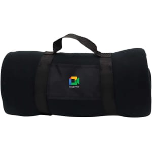 A folded green blanket secured with a black strap, featuring a branding logo.