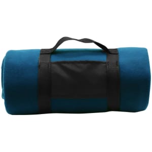 A rolled-up blanket in a teal colour, secured with a black strap. The blanket has a logo on the strap.