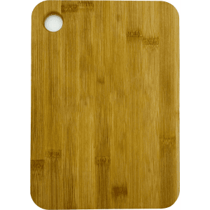 A large bamboo cutting board with a rounded corner and a hole for hanging. The board features a natural wood grain pattern.