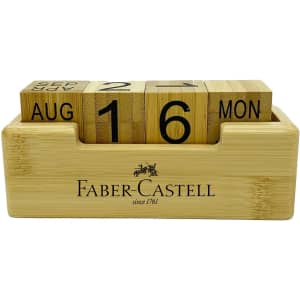 A bamboo perpetual calendar featuring black wooden blocks for the month, date, and day, set in a wooden holder.