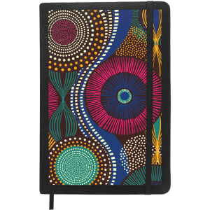 A black A5 notebook featuring a vibrant, circular patterned cover with shades of blue, pink, yellow, and white.