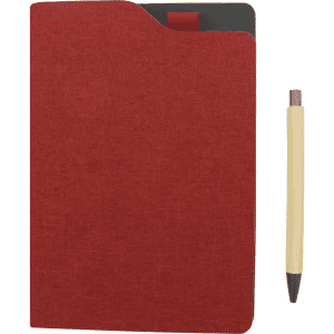 A red A5 notebook with a textured cover and a matching pen beside it. The notebook features a pocket and a ribbon marker.