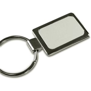 A rectangular silver keychain with a smooth surface and a metal ring attachment.