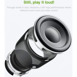 A Bluetooth speaker with a transparent casing and a prominent black speaker cone, featuring a logo.