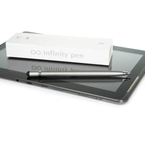 A silver metal pen rests on a tablet, next to its white packaging featuring a logo.