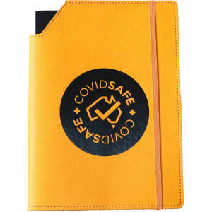 A large, yellow leatherette notebook cover with an elastic band and a logo on the front.