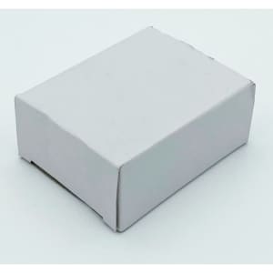 A small white cardboard box with a plain design, likely containing dental floss products.