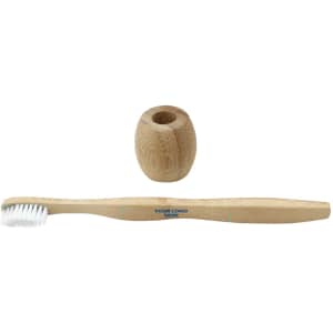 A bamboo toothbrush with a handle and matching holder. Both items feature a natural wood finish.