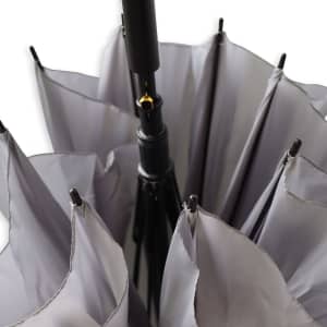 A corporate umbrella in grey with multiple panels and a central black handle, featuring a logo on the shaft.