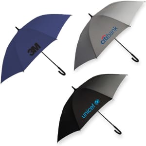 Three umbrellas in blue, grey, and black, each featuring different logos on the canopy.