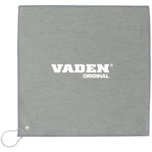 A grey golf towel with a loop for attachment, featuring a logo in the centre.