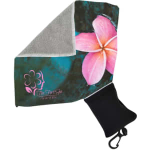 A microfibre towel with a floral design in pink and grey, stored in a black pouch featuring a logo.