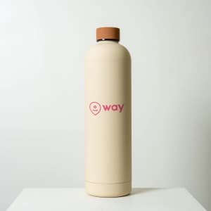 A drink bottle with a beige finish and a brown cap, featuring a logo on its surface.