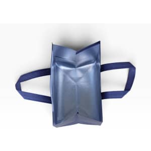 An insulated reusable bag in blue with two handles, displayed from a top-down view.
