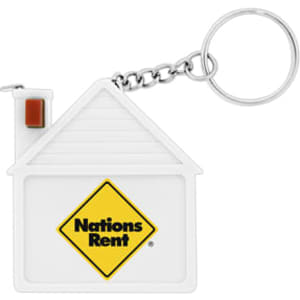 A white tape measure shaped like a house with a keychain attachment, featuring a logo on the front.