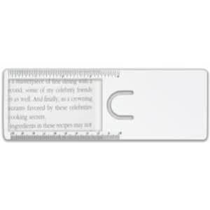 A clear magnifier ruler features a rounded cut-out and printed measurement markings, ideal for reading and measuring.