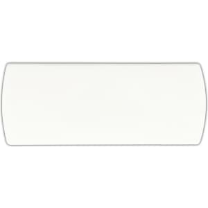 A white bandage dispenser with a rounded shape and a smooth surface, featuring a logo.