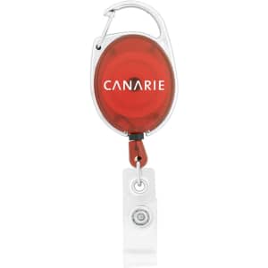 A retractable badge holder in red with a silver clip and a transparent badge attachment at the bottom.