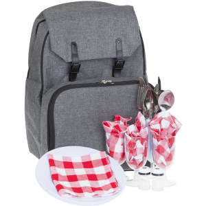A grey backpack with cutlery, red and white check napkins, plates, and wine glasses. It features a logo.