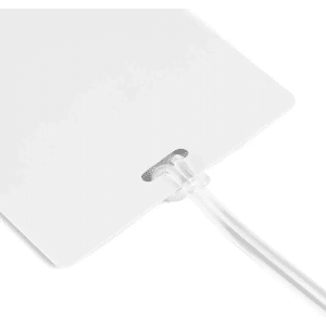 A large white luggage tag with a clear attachment loop, designed for easy identification.