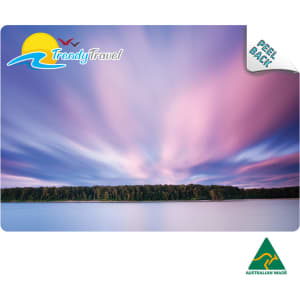 A mouse mat featuring a serene landscape with a soft gradient of purple and blue, and a logo in the corner.