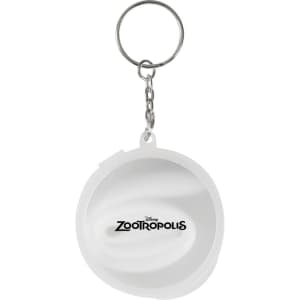 A keychain featuring a round white design with a logo and branding.