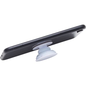 A phone grip in white attached to the back of a black smartphone. The grip features a rounded design for stability.