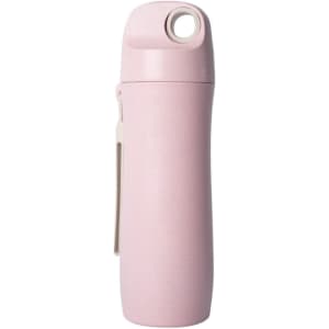 A drink bottle in pastel pink made from wheat straw, featuring a loop for easy carrying and a sleek design.