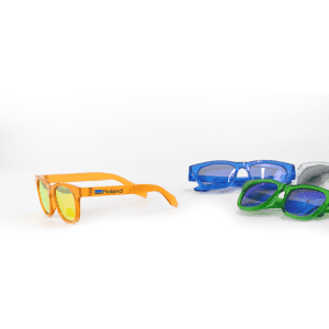 Brightly coloured sunglasses in orange, blue, and green, featuring a logo on one pair.