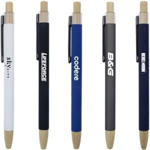 A collection of bamboo click pens in white, black, blue, dark grey, and natural finishes, each with a clip and branding.