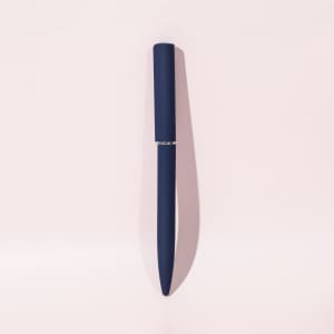 A blue ballpoint pen with a mirror finish, featuring a sleek design and a branding logo.