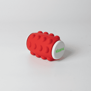 A red Whirl Popper Spinner with a textured surface and end caps, featuring a logo.