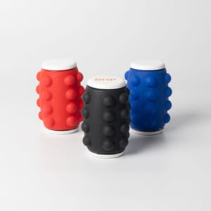 A set of three drink bottles in red, black, and blue with a textured grip and a logo on top.