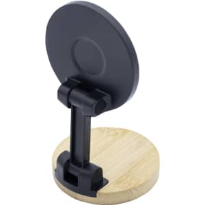 A black magnetic phone holder with a round top and a bamboo base, featuring a logo on the back.