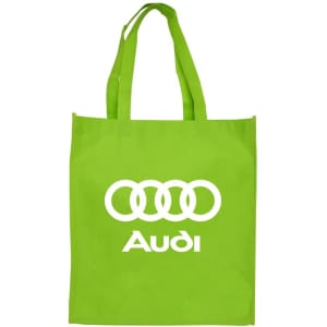 A large green shopping tote bag with long handles and a logo prominently displayed on the front.