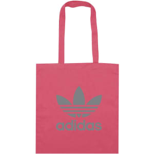 A pink tote bag with a grey logo and two handles. The bag features a simple, minimalist design.