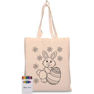 A natural-coloured tote bag featuring a bunny design with flowers and an egg, accompanied by a set of colourful crayons.