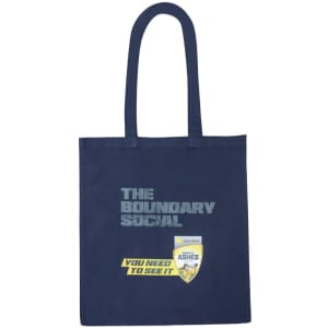 A navy-blue tote bag with a logo and a graphic design featuring vibrant colours.