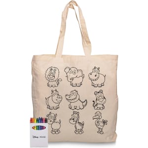 A cream-coloured tote bag featuring outlined cartoon animals, accompanied by a crayon set in various colours.