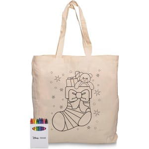 A cream calico bag featuring a colouring design of a Christmas stocking, accompanied by a crayon set in various colours.