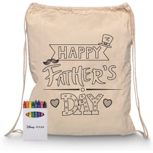 A cream drawstring bag featuring a Happy Father's Day design and a set of colourful crayons in a box.