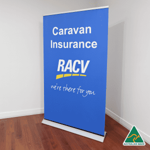 A blue roll-up banner displaying promotional text, featuring a logo and an Australian Made badge on the bottom.