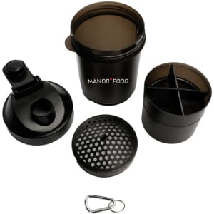 A drink bottle in black, featuring a shaker cup with a detachable lid, strainer, and mixing compartment. Includes a carabiner.