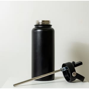 A drink bottle in matte black, featuring a removable lid and a stainless steel straw. It has a logo on the side.
