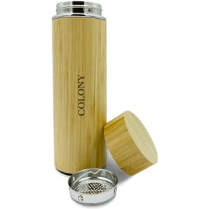 A drink bottle with a bamboo exterior, metal lid, and a removable strainer. Features a logo on the body.